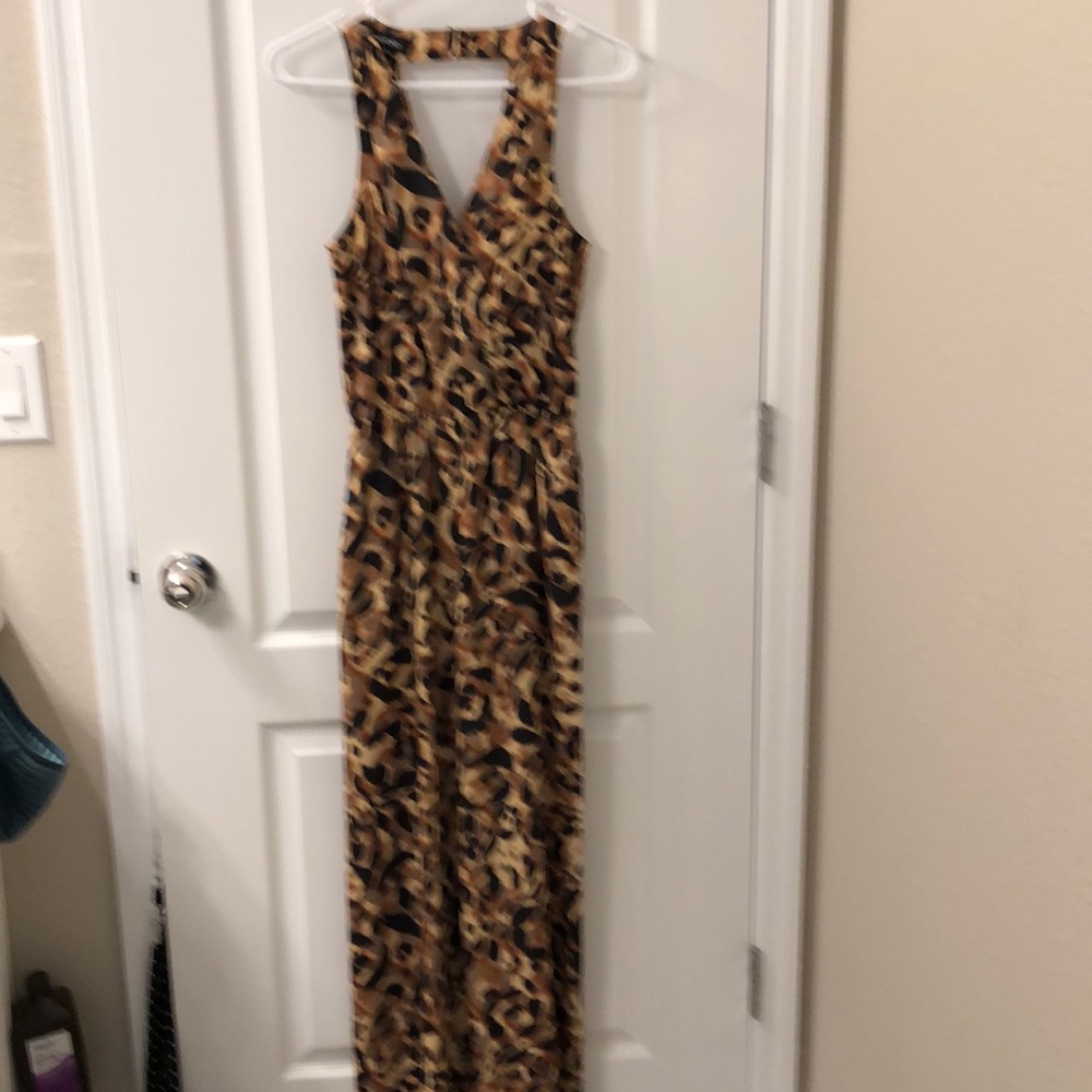 Leopard print bebe one/piece jumper. Size 2